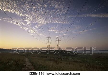 Stock Photograph - industry, rural, dusk, evening, towers, cables, power. Fotosearch
