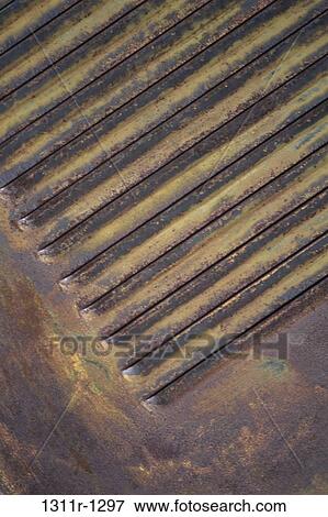 Stock Photo - pattern, background, metal, vent, weathered, cropped. Fotosearch
