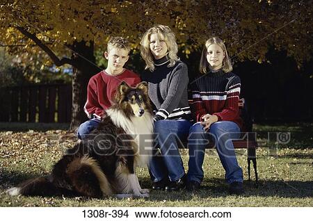 people, autumn, dog, pet, outdoors, family View Large Photo Image Picture - people, autumn, dog, pet, outdoors, family. Fotosearch