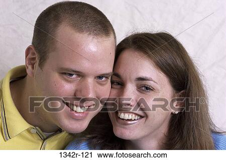people, couple, indoors, headshot, Caucasian, young adult View Large Photo Image Stock Image - people, couple, indoors, headshot, Caucasian, young adult. Fotosearch