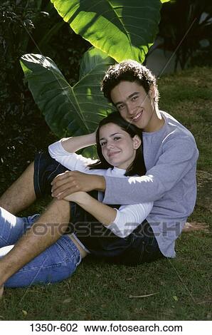 people, couple, outdoors, relaxing, teens, brunette View Large Photo Image Stock Image - people, couple, outdoors, relaxing, teens, brunette. Fotosearch