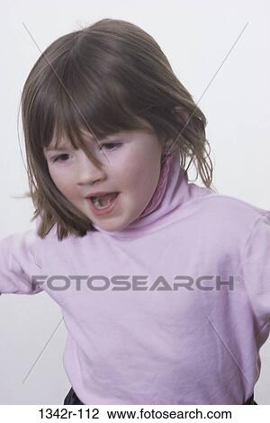 Stock Image - people, girl, child, brunette, indoors, Caucasian. Fotosearch