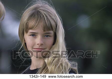 Stock Photo - people, girl, outdoors, child, headshot, Caucasian. Fotosearch