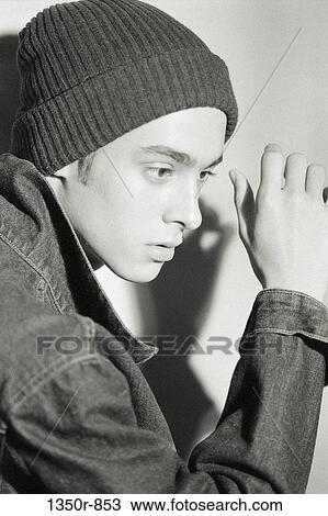 people, hand, male, shadow, listening, outdoors, cap View Large Photo Image Stock Image - people, hand, male, shadow, listening, outdoors, cap. Fotosearch