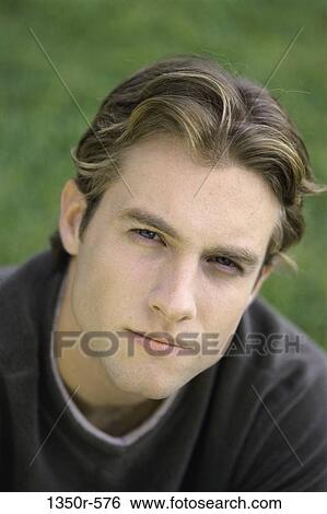 people, outdoors, serious, headshot, Caucasian View Large Photo Image Stock Photograph - people, outdoors, serious, headshot, Caucasian. Fotosearch