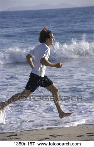 Stock Photo - people, running, beach, Caucasian, run. Fotosearch