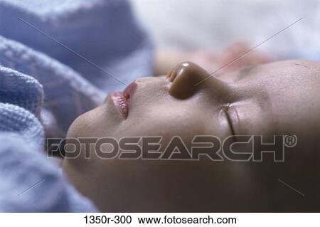 Stock Image - people, sleeping, baby, content, peaceful, innocent, precious. Fotosearch