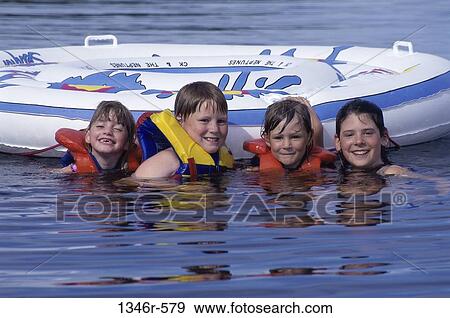 Stock Photo - people, swim, water, smiling, swimming, beach. Fotosearch
