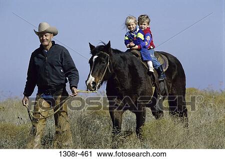 people, walking, riding, horse, outdoors, family View Large Photo Image Stock Image - people, walking, riding, horse, outdoors, family. Fotosearch