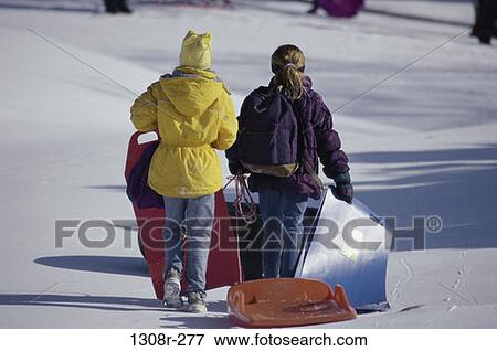 people, winter, outdoors, pulling, children, sleds View Large Photo Image Stock Photo - people, winter, outdoors, pulling, children, sleds. Fotosearch