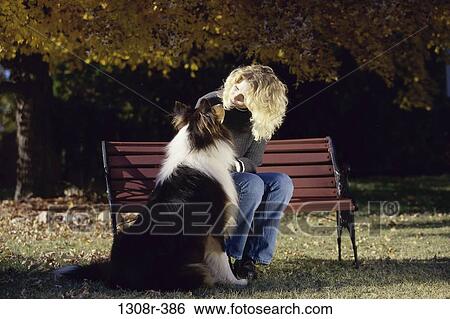 people, woman, autumn, dog, bench, sitting View Large Photo Image Stock Photograph - people, woman, autumn, dog, bench, sitting. Fotosearch