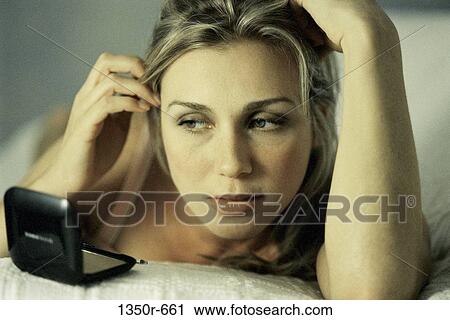 Stock Image - people, woman, makeup, indoors, headshot, Caucasian. Fotosearch