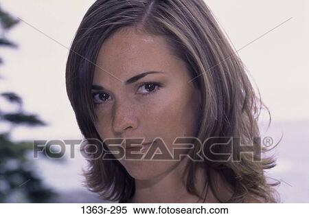 Stock Photography - people, woman, outdoors, posing, brunette, headshot. Fotosearch