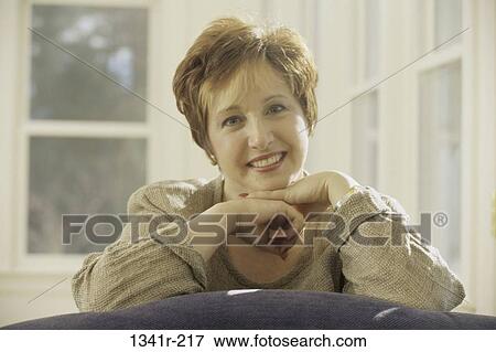 people, woman, smiling, senior, Middle-aged, contemplation, smile View Large Photo Image Stock Photo - people, woman, smiling, senior, Middle-aged, contemplation, smile. Fotosearch