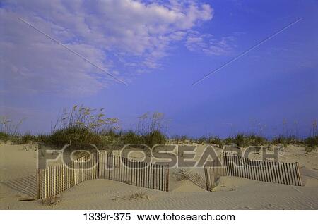 sky, fence, sand, sand dune, beach, calm, coast View Large Photo Image Stock Photography - sky, fence, sand, sand dune, beach, calm, coast. Fotosearch