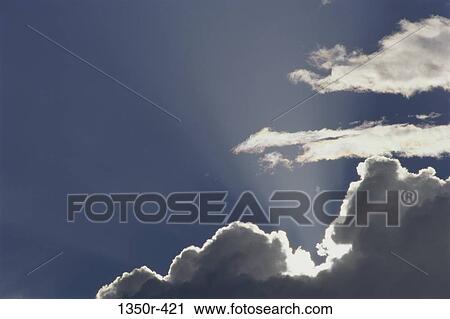 Stock Image - sky, light, clouds, shining, nature, inspirational. Fotosearch