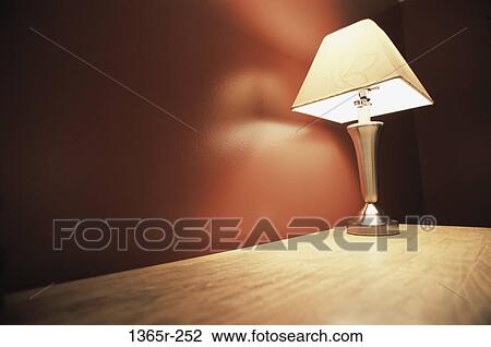 corner, light, illuminated, table, lamp, shade View Large Photo Image Stock Image - corner, light, illuminated, table, lamp, shade. Fotosearch