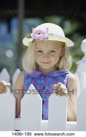 fence, people, smiling, hat, girl, flower, outdoors View Large Photo Image Stock Photography - fence, people, smiling, hat, girl, flower, outdoors. Fotosearch