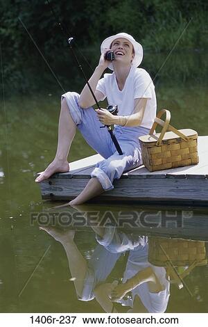 fish, relaxed, people, reflection, woman, telephone, talking View Large Photo Image Stock Photo - fish, relaxed, people, reflection, woman, telephone, talking. Fotosearch
