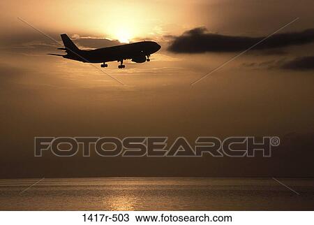 flight, airplane, water, ocean, flying, silhouette View Large Photo Image Stock Image - flight, airplane, water, ocean, flying, silhouette. Fotosearch