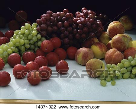 Stock Image - grapes, peaches, plums, fruit, sweet, food. Fotosearch