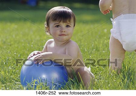 grass, people, playing, ball, holding, outdoors, kneeling View Large Photo Image Stock Image - grass, people, playing, ball, holding, outdoors, kneeling. Fotosearch