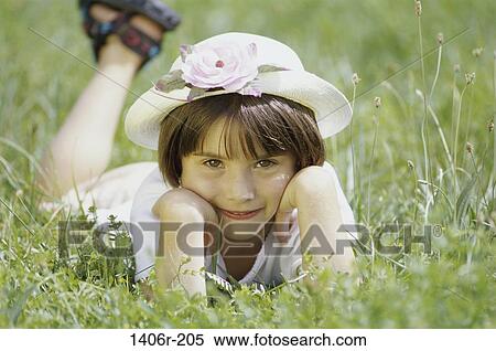 grass, people, smiling, hat, girl, outdoors View Large Photo Image Stock Photography - grass, people, smiling, hat, girl, outdoors. Fotosearch