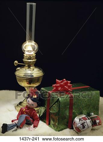 light, lamp, wrapped, Christmas, gift, present, still life View Large Photo Image Stock Image - light, lamp, wrapped, Christmas, gift, present, still life. Fotosearch