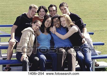 multiethnic, people, smiling, sitting, outdoors, friends View Large Photo Image Picture - multiethnic, people, smiling, sitting, outdoors, friends. Fotosearch