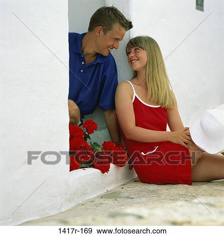people, couple, sitting, outdoors, Caucasian View Large Photo Image Stock Photo - people, couple, sitting, outdoors, Caucasian. Fotosearch