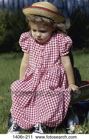 people, hat, sitting, girl, outdoors, child, sad View Large Photo Image Stock Image - people, hat, sitting, girl, outdoors, child, sad. Fotosearch