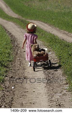 people, hat, walking, girl, path, friends, child View Large Photo Image Stock Photo - people, hat, walking, girl, path, friends, child. Fotosearch