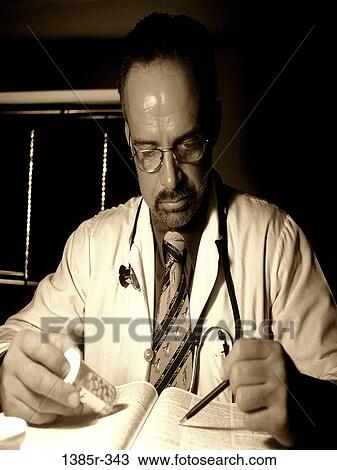 people, industry, reading, book, doctor, prescription View Large Photo Image Stock Image - people, industry, reading, book, doctor, prescription. Fotosearch