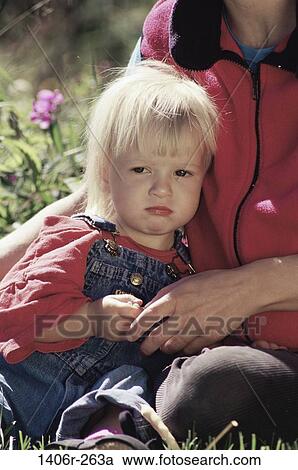 people, mother, outdoors, frowning, family, blond, overalls View Large Photo Image Stock Image - people, mother, outdoors, frowning, family, blond, overalls. Fotosearch