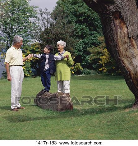 people, outdoors, family, grandparents, grandchild View Large Photo Image Stock Image - people, outdoors, family, grandparents, grandchild. Fotosearch