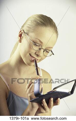 people, pen, planner, eyeglasses, planning, schedule, blond View Large Photo Image Stock Image - people, pen, planner, eyeglasses, planning, schedule, blond. Fotosearch