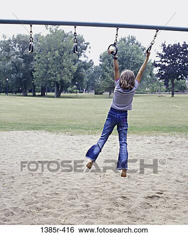 Stock Photograph - people, playing, crossing, swinging, girl, swing, playground. Fotosearch