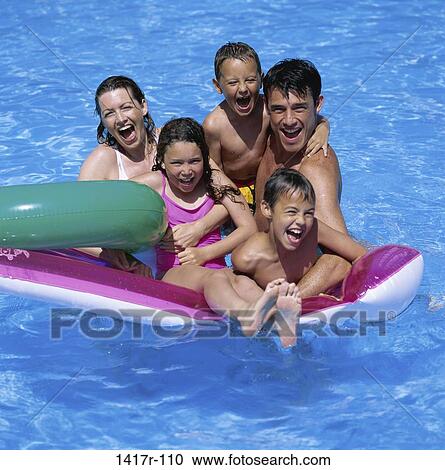 people, pool, outdoors, family, vacation, brunette View Large Photo Image Stock Image - people, pool, outdoors, family, vacation, brunette. Fotosearch