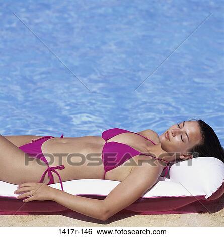 people, pool, woman, raft, relaxing, resting View Large Photo Image Stock Photograph - people, pool, woman, raft, relaxing, resting. Fotosearch