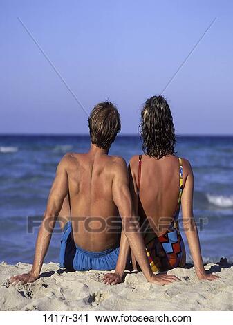 people, relaxation, couple, sitting, beach, back, body parts View Large Photo Image Stock Image - people, relaxation, couple, sitting, beach, back, body parts. Fotosearch