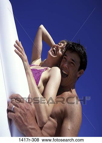 people, smiling, couple, beach, laughing, joyous, smile View Large Photo Image Stock Photo - people, smiling, couple, beach, laughing, joyous, smile. Fotosearch