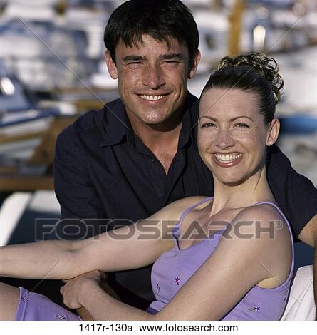 Stock Image - people, smiling, couple, outdoors, smile, Caucasian, young adult. Fotosearch