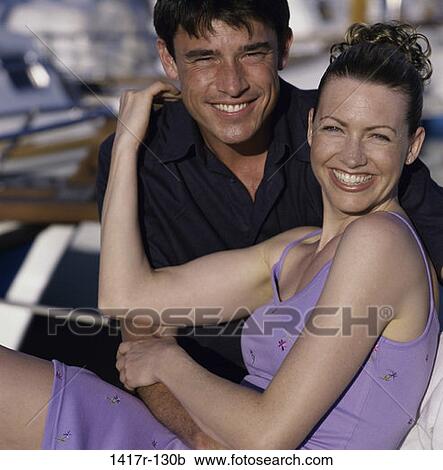 people, smiling, couple, outdoors, smile, Caucasian, young adult View Large Photo Image Stock Image - people, smiling, couple, outdoors, smile, Caucasian, young adult. Fotosearch