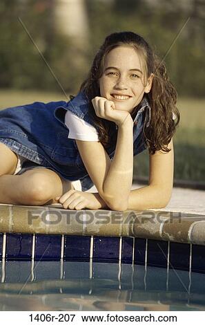 people, smiling, leaning, outdoors, poolside, relaxing, smile View Large Photo Image Stock Photo - people, smiling, leaning, outdoors, poolside, relaxing, smile. Fotosearch