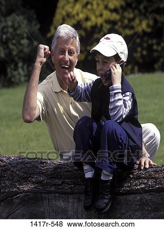 people, smiling, telephone, talking, listening, conversation, excited View Large Photo Image Stock Photo - people, smiling, telephone, talking, listening, conversation, excited. Fotosearch