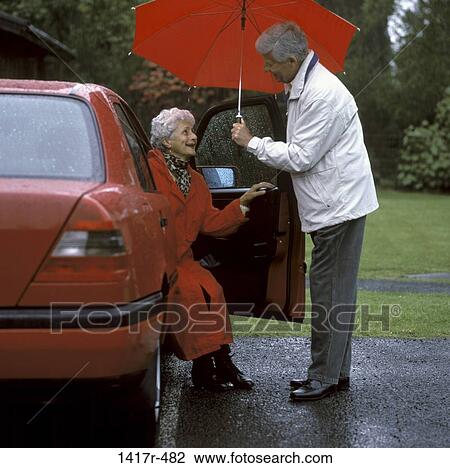 people, smiling, umbrella, couple, rain, senior View Large Photo Image Stock Image - people, smiling, umbrella, couple, rain, senior. Fotosearch