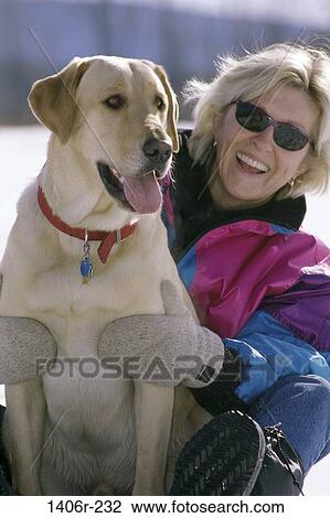 people, snow, woman, dog, pet, sunglasses, outdoors View Large Photo Image Stock Image - people, snow, woman, dog, pet, sunglasses, outdoors. Fotosearch