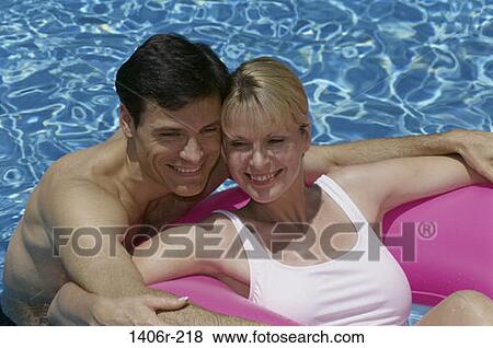 people, swim, relaxation, pool, ripples, smiling View Large Photo Image Stock Photo - people, swim, relaxation, pool, ripples, smiling. Fotosearch
