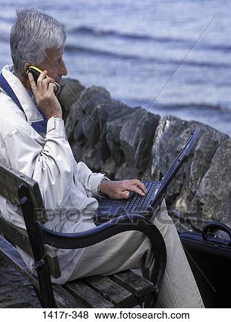 people, telephone, talking, bench, senior, computer View Large Photo Image Stock Photo - people, telephone, talking, bench, senior, computer. Fotosearch