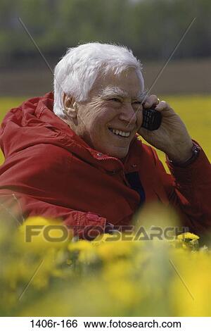 Stock Photograph - people, telephone, talking, senior, phone, outdoors. Fotosearch